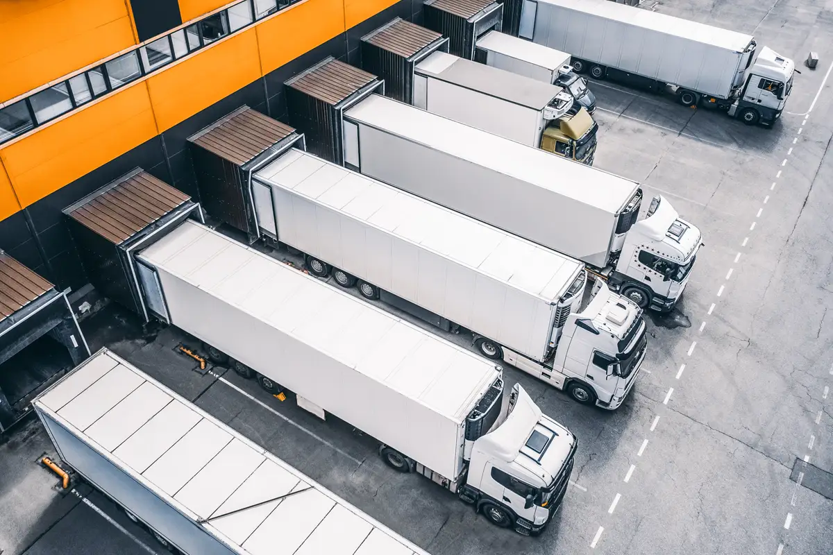 Fleet of heavy-duty trucks staged for service