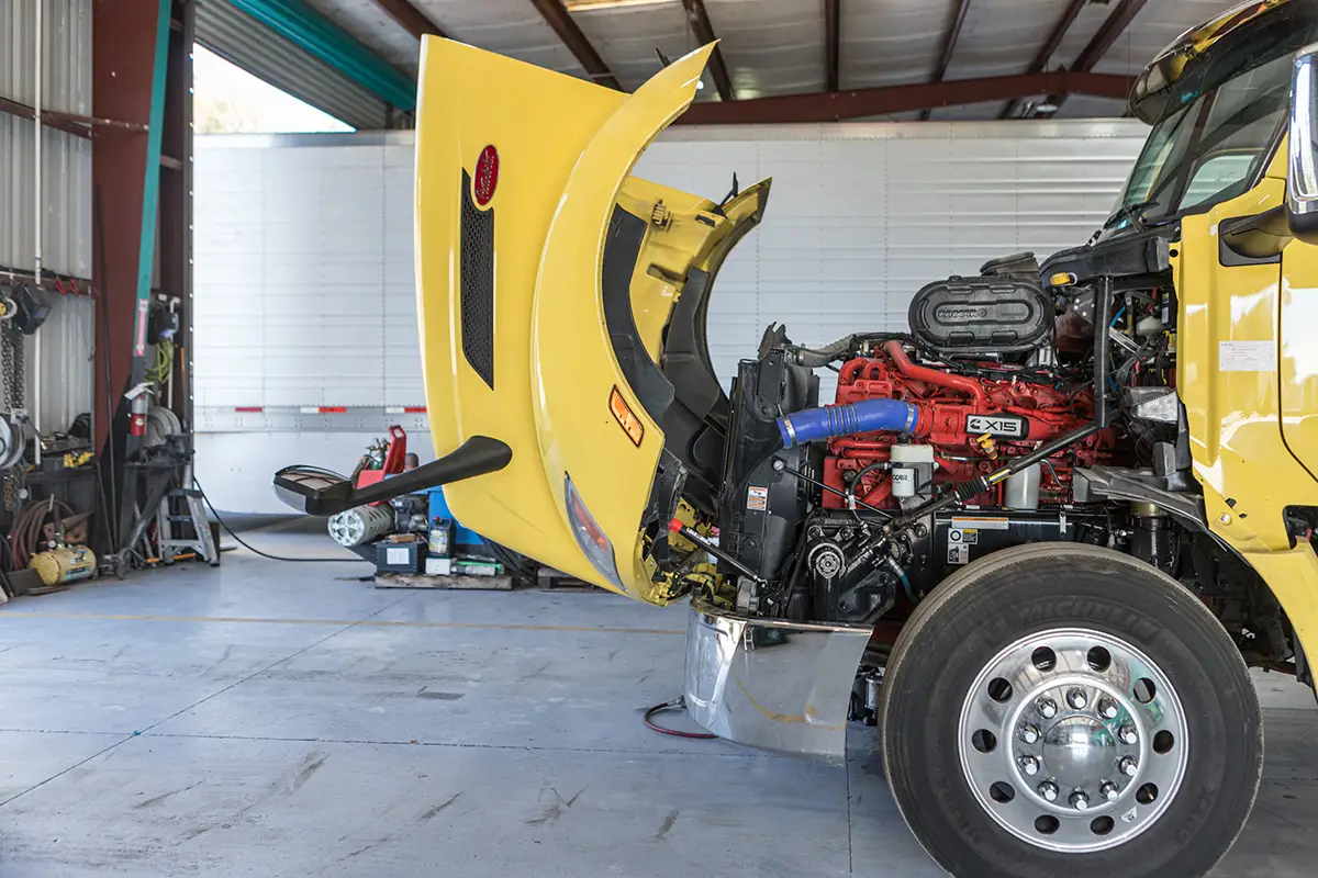 Technician performing preventive maintenance